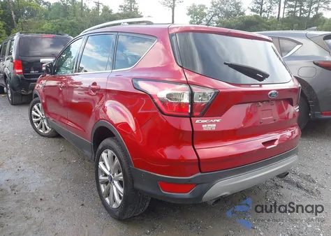 2017 Ford Escape Titanium z USA, uszkodzony, nr VIN 1FMCU0J96HUE29464